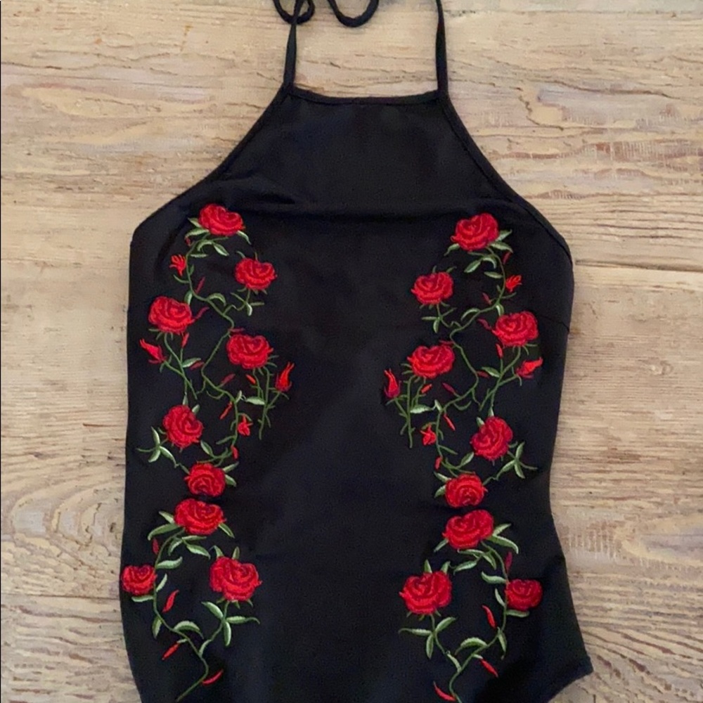 Beautiful rose embroidered body suit.